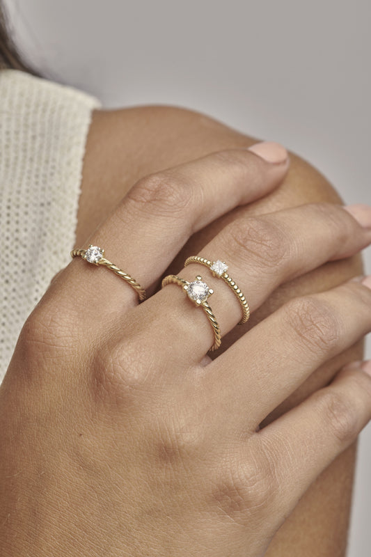 KAN0013TA - Anillo Minimal 4mm 9k Trenzado (0.26ct)